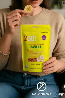Eco-Friendly Woman Enjoying 2GO! Organic Banana Snack Outdoors – No Chemicals, Organic Product – ecobeaut.com