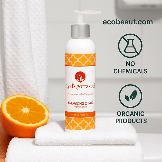 Energizing Citrus Body Lotion by A Girl’s Gotta Spa! placed in a spa-like bathroom scene with fresh orange and soft towel – organic ingredients, no chemicals, ecobeaut.com