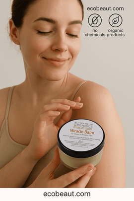 Fair-skinned woman applying Miracle Balm from Butter Me Up Organics to her forearm – natural herbal balm for muscle and joint pain relief, labeled organic and chemical-free, ecobeaut.com