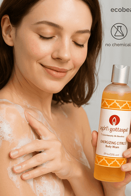 Fair-skinned woman gently washing shoulder with Energizing Citrus Body Wash – natural foaming cleanser with organic ingredients, no chemicals, ecobeaut.com