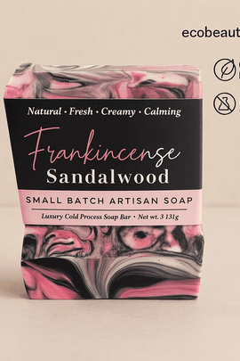 Frankincense Sandalwood artisan soap bar with pink, black, and white swirls, displayed on a beige background with ecobeaut.com, “ORGANIC PRODUCTS,” and “NO CHEMICALS” icons in the top right corner.