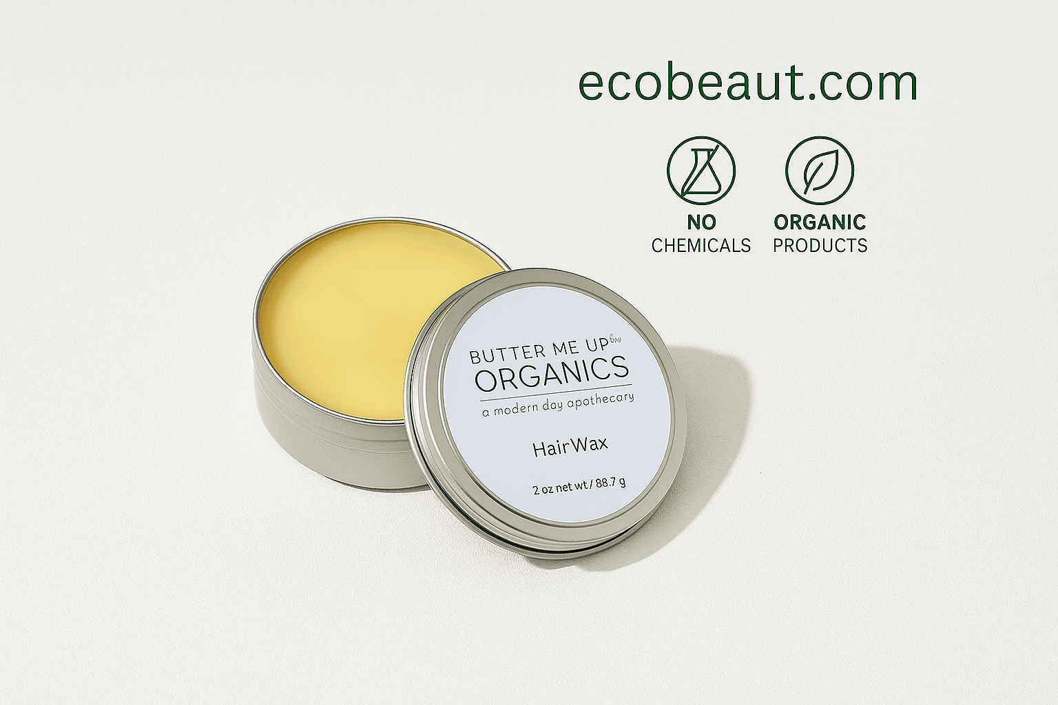 Hair Wax tin by Butter Me Up Organics on a clean white background, with no plants, featuring ecobeaut.com and eco-friendly icons in the top right corner.