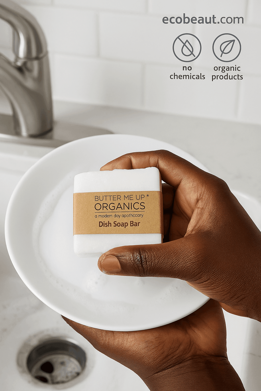 Hand holding Butter Me Up Organics Dish Soap Bar – eco-friendly, chemical-free kitchen soap with kraft label, shown in a modern white kitchen

