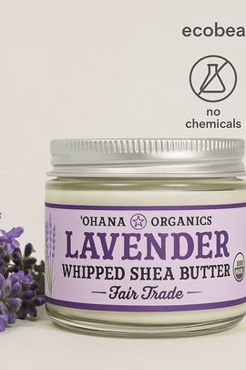 Lavender whipped shea butter by Ohana Organics with fresh lavender flowers beside the jar. Top right shows ecobeaut.com and icons for no chemicals and organic products.