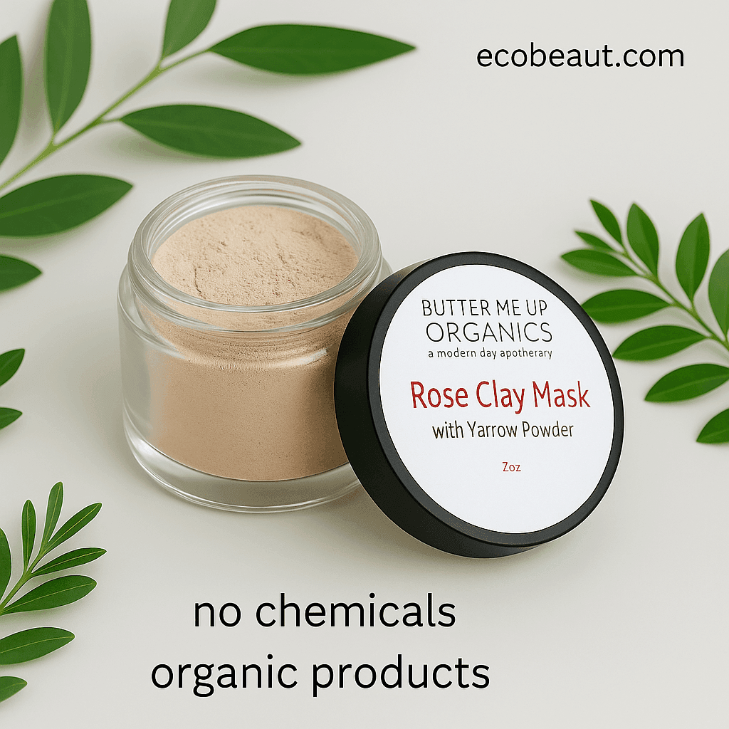Open jar of Rose Clay Mask with Yarrow Powder by Butter Me Up Organics, surrounded by green leaves on a clean white background, with ecobeaut.com in the top right corner and labels 'no chemicals' and 'organic products' clearly visible