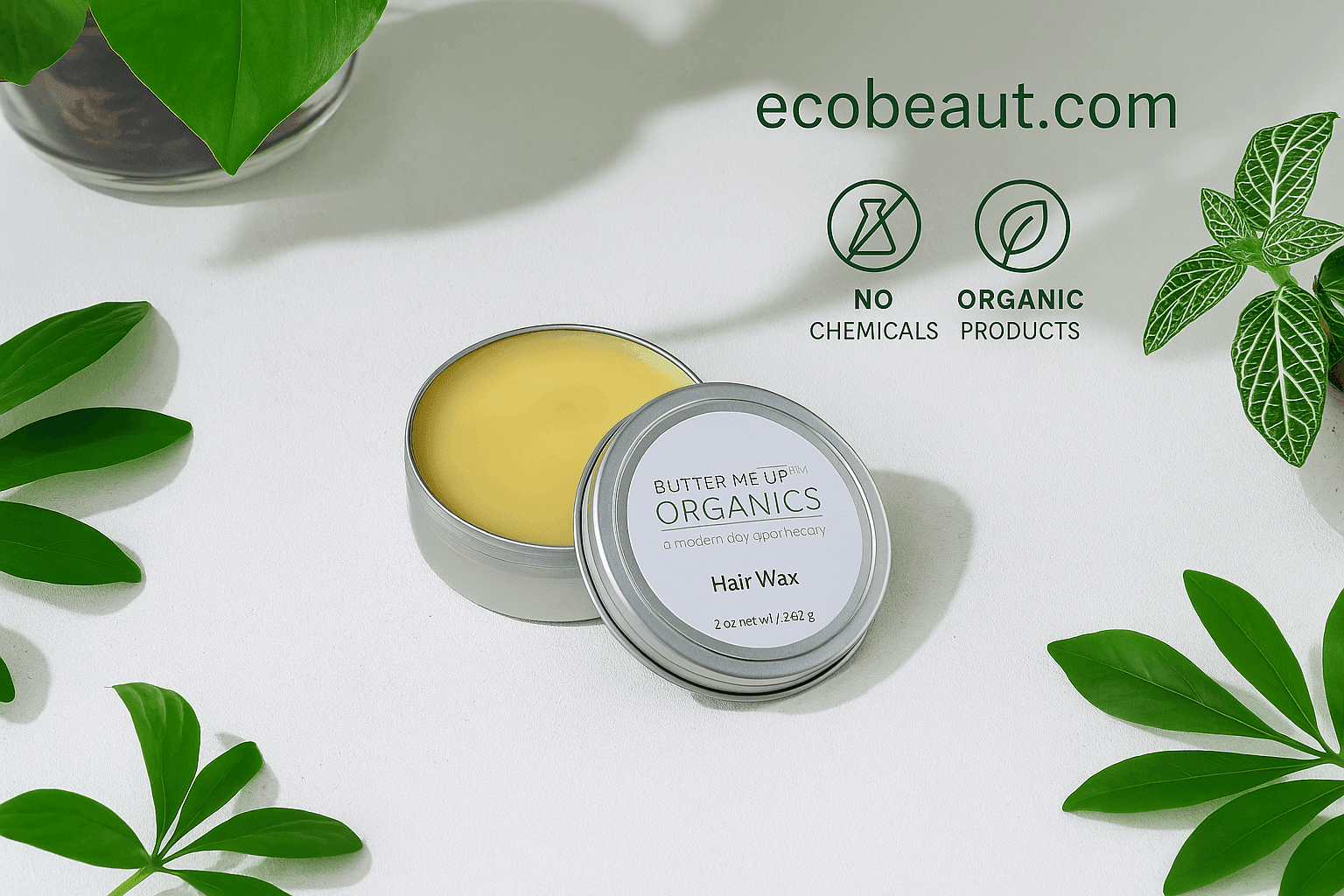 Butter Me Up Organics hair wax container with green leaves on a light background, featuring ecobeaut.com branding.