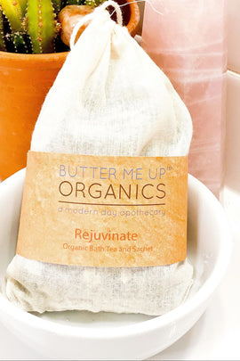 Butter Me Up Organics bath tea package with a cactus plant in the background