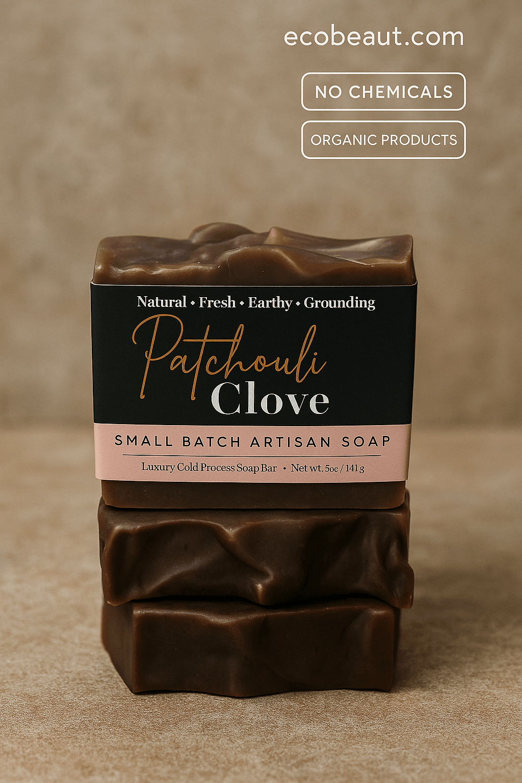 Patchouli Clove artisan soap bar by ecobeaut.com placed on a neutral surface, featuring “NO CHEMICALS” and “ORGANIC PRODUCTS” icons in the top right corner.





