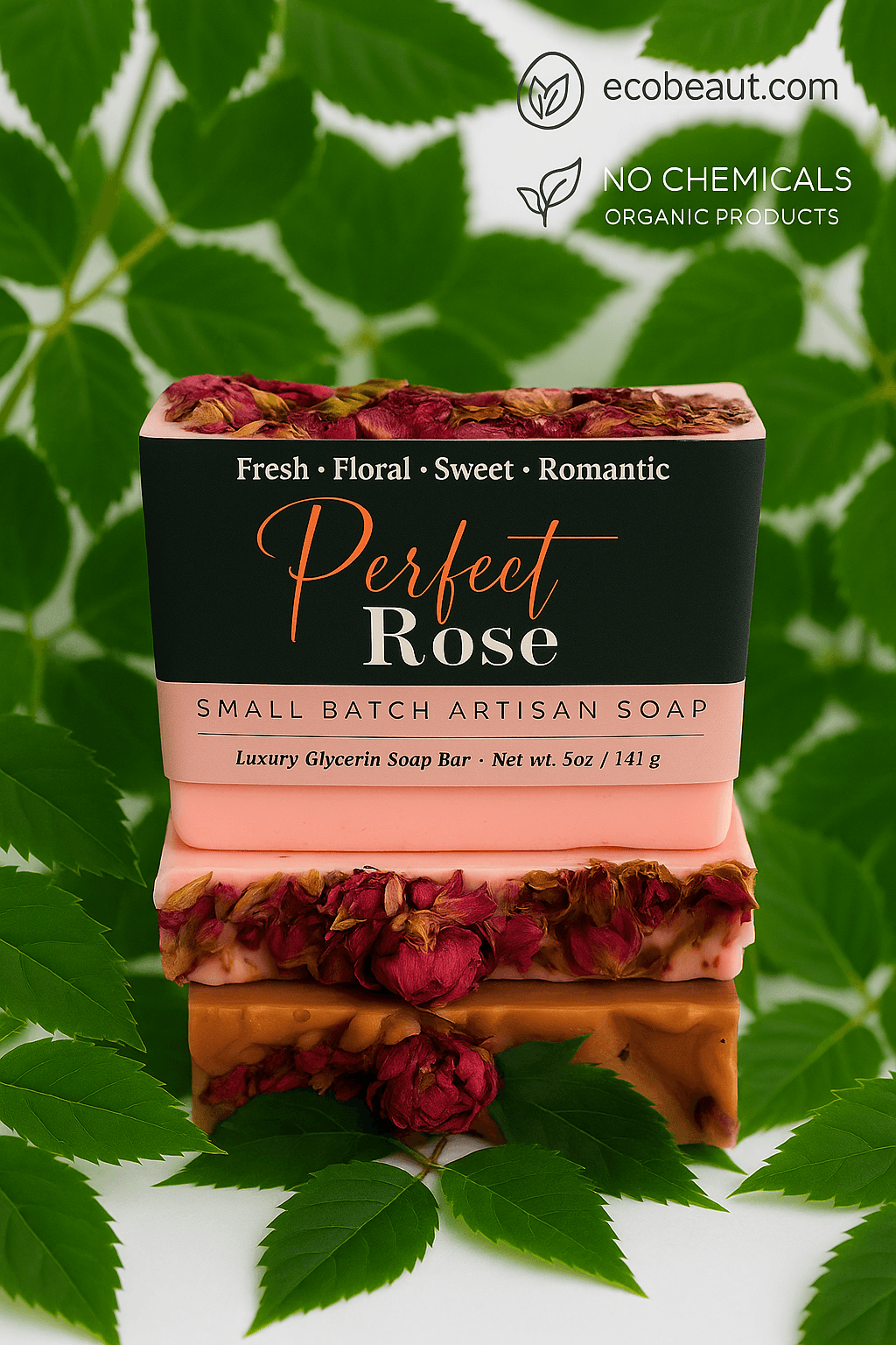 Perfect Rose artisan soap bar by ecobeaut.com placed among lush greenery, with dried rose petals embedded, featuring “NO CHEMICALS” and “ORGANIC PRODUCTS” icons in the top right corner.





