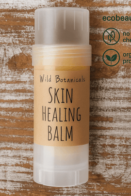 Skin Healing Balm by Wild Botanicals – all-natural, vegan balm for dry and irritated skin, shown on rustic wooden background with eco-friendly branding from ecobeaut.com