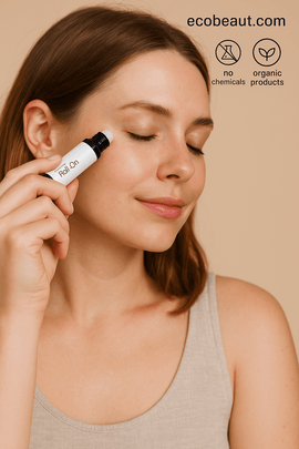 Smiling woman applying Butter Me Up Organics essential oil roll-on to temple, labeled ecobeaut.com, no chemicals and organic products – natural headache relief USA