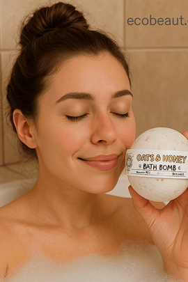 Smiling woman relaxing in a bath holding an Oats & Honey Bath Bomb next to her face, featuring ecobeaut.com and organic product icons