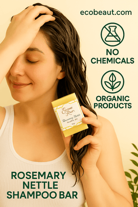 Smiling woman with wet hair holding a Rosemary Nettle Shampoo Bar from Elegant Rose, gently massaging her scalp, with eco-friendly icons and ecobeaut.com in the top right corner – labeled no chemicals and organic products.