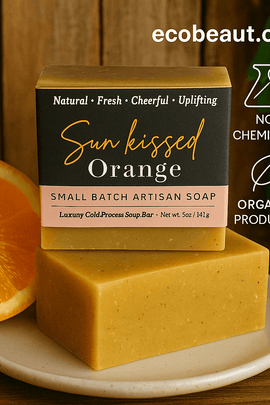  Sun kissed Orange artisan soap bar by ecobeaut.com on a ceramic plate with a sliced orange and green leaves, featuring “NO CHEMICALS” and “ORGANIC PRODUCTS” icons in the upper right corner.




