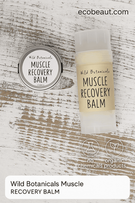 Two Wild Botanicals Muscle Recovery Balm containers on rustic wood surface with ecobeaut.com and eco-friendly icons.