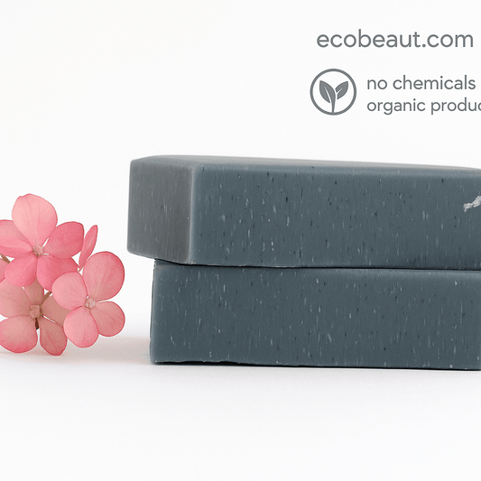 Two stacked charcoal soap bars with pink flowers – detoxifying handmade soap with no chemicals and organic ingredients, ecoBeaut.com