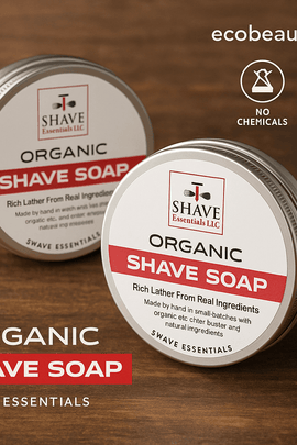Two tins of Shave Essentials Organic Shave Soap displayed on a wooden surface with eco-friendly icons and ecobeaut.com branding, emphasizing natural ingredients and handcrafted quality.