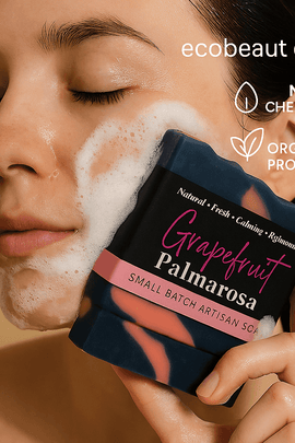  Woman cleansing her face with Grapefruit Palmarosa artisan soap, showing rich lather, with ecobeaut.com, “NO CHEMICALS,” and “ORGANIC PRODUCTS” icons clearly visible in the top right corner.