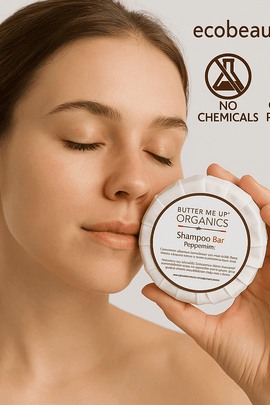 Woman gently holding Butter Me Up Organics Peppermint Shampoo Bar with ecobeaut.com, No Chemicals, Organic Products labels in the top right corner.






