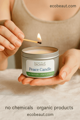 Person lighting a 'Peace Candle' from Butter Me Up Organics with a visible label.