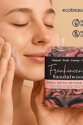 Woman smiling gently while applying Frankincense Sandalwood soap to her cheek, with ecobeaut.com, “ORGANIC PRODUCTS,” and “NO CHEMICALS” icons in the top right corner.