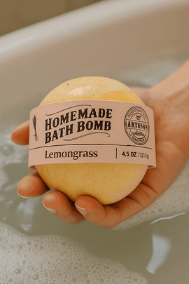 Woman using natural Lemongrass Bath Bomb in a relaxing bath – eco-friendly skincare from ecobeaut.com