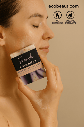 Woman washing her face with French Lavender artisan soap, featuring ecobeaut.com, “NO CHEMICALS,” and “ORGANIC PRODUCTS” icons in the top right corner.