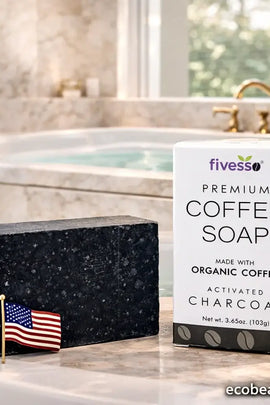 Bar of coffee soap with packaging on a bathroom counter