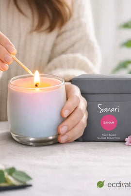 Person lighting a candle with 'Sanari' packaging in the background