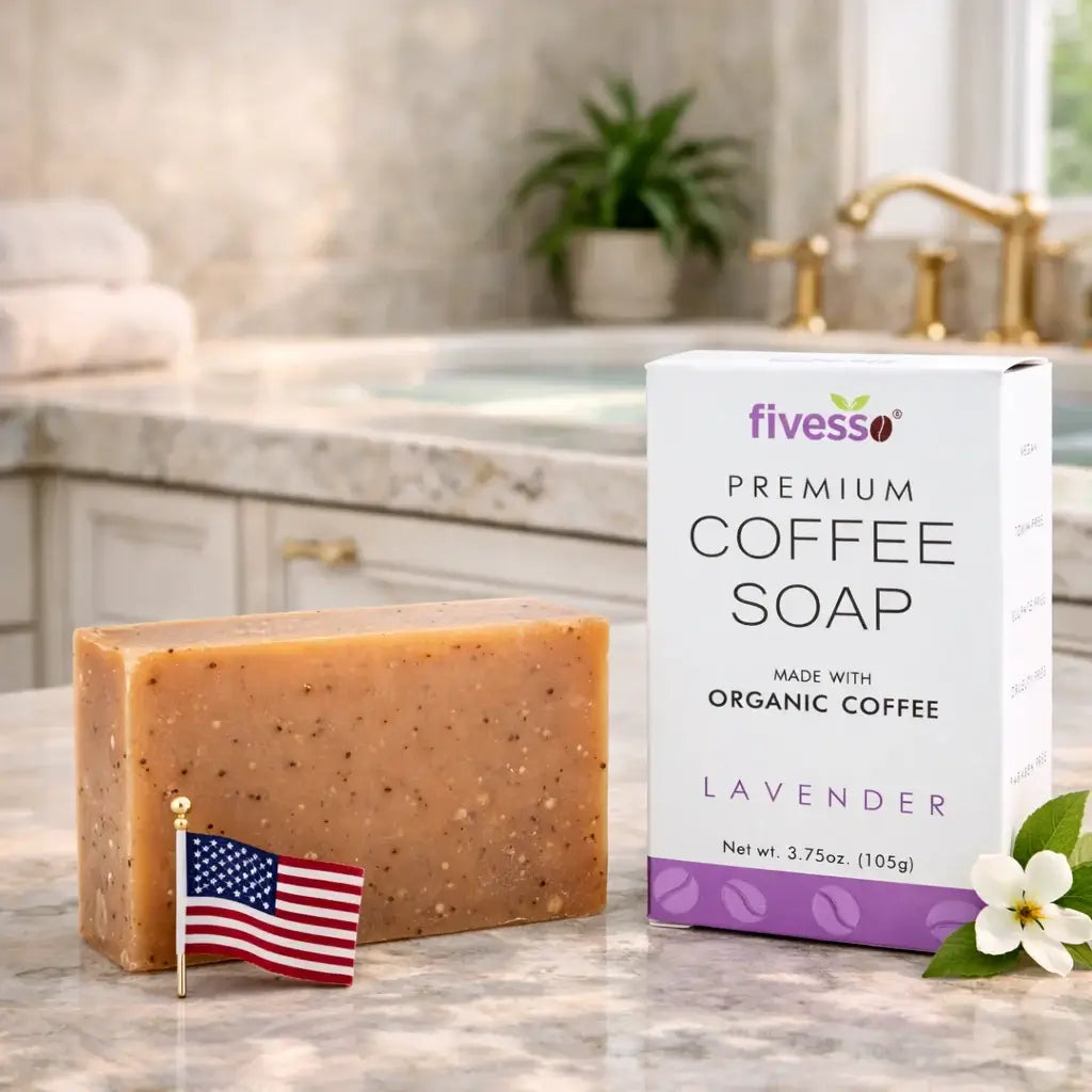 Bar of coffee soap with a box labeled 'fivesso Premium Coffee Soap' on a bathroom counter.