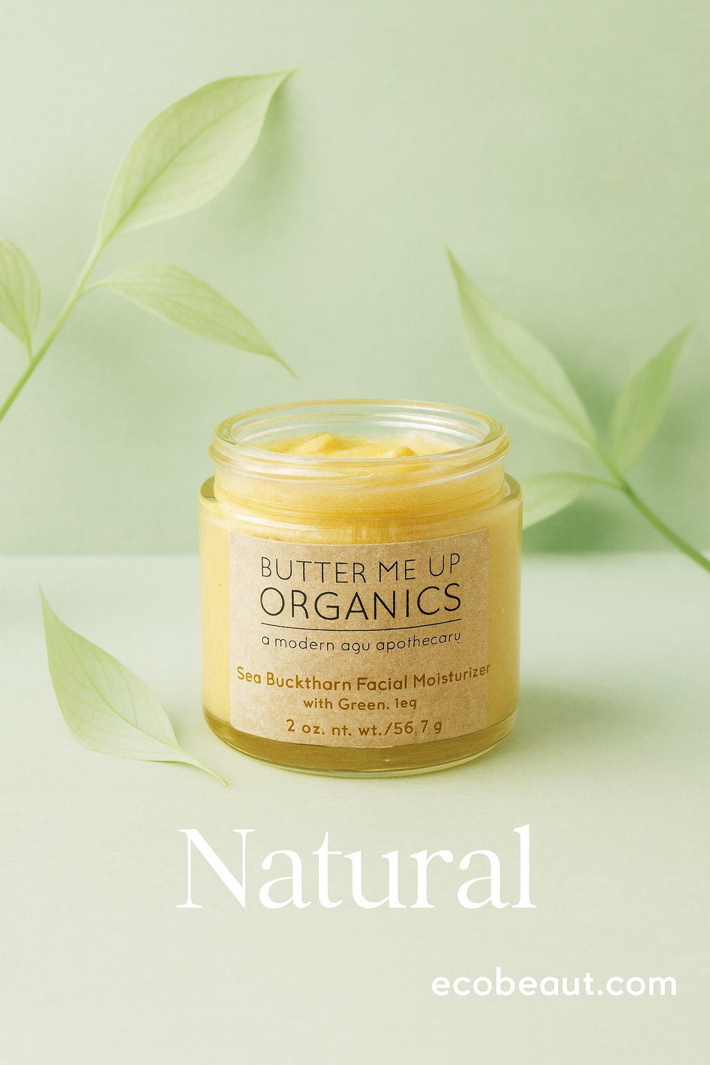 Sea Buckthorn facial moisturizer Butter Me Up Organics in a glass jar on a soft green background with leaves, natural organic skincare product from ecobeaut.com