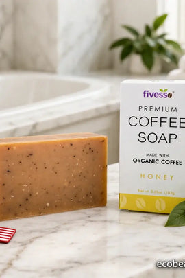 Fivesso coffee soap bar and packaging on a marble surface with a bathroom background